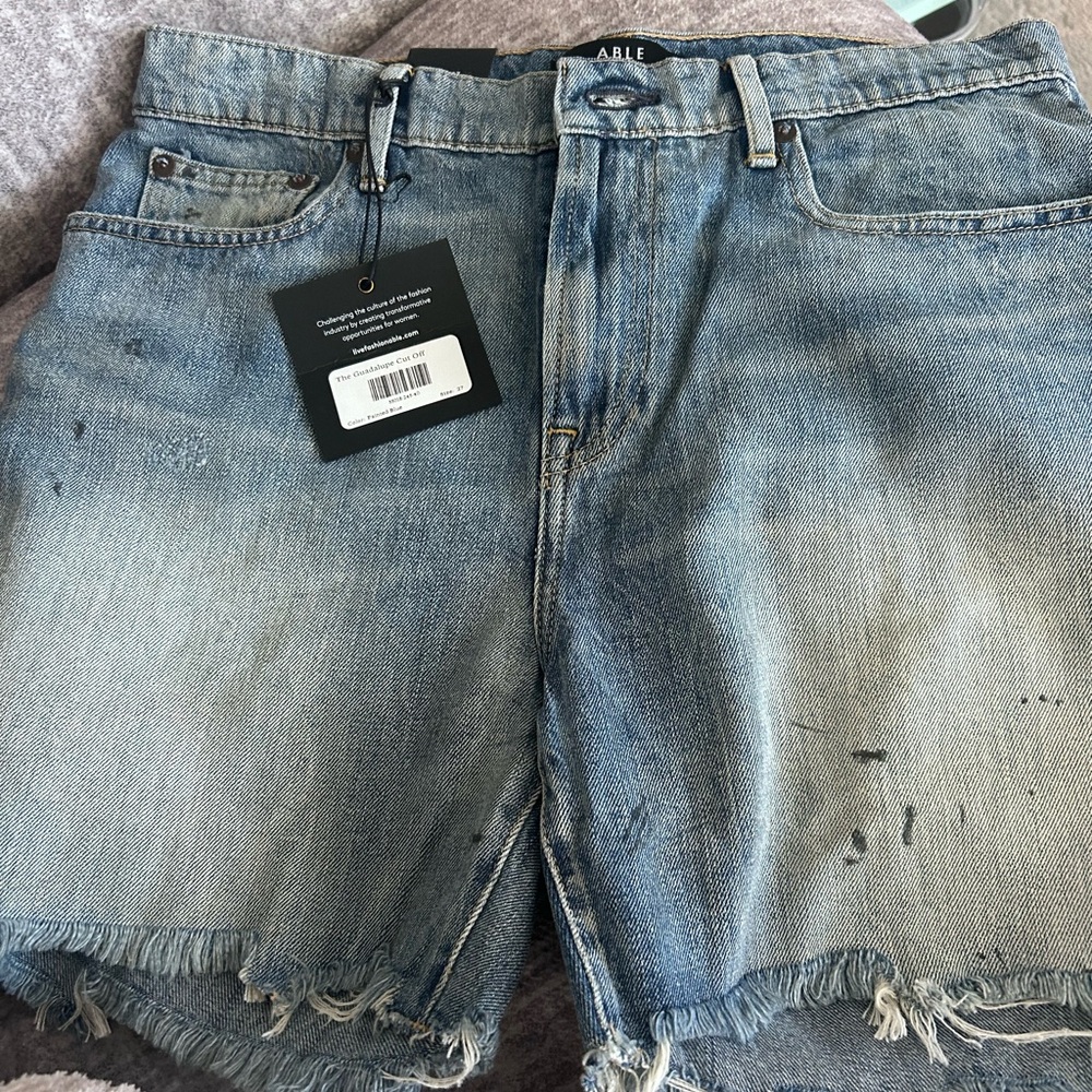 Able cut off shorts. Size 27. Color painted blue
